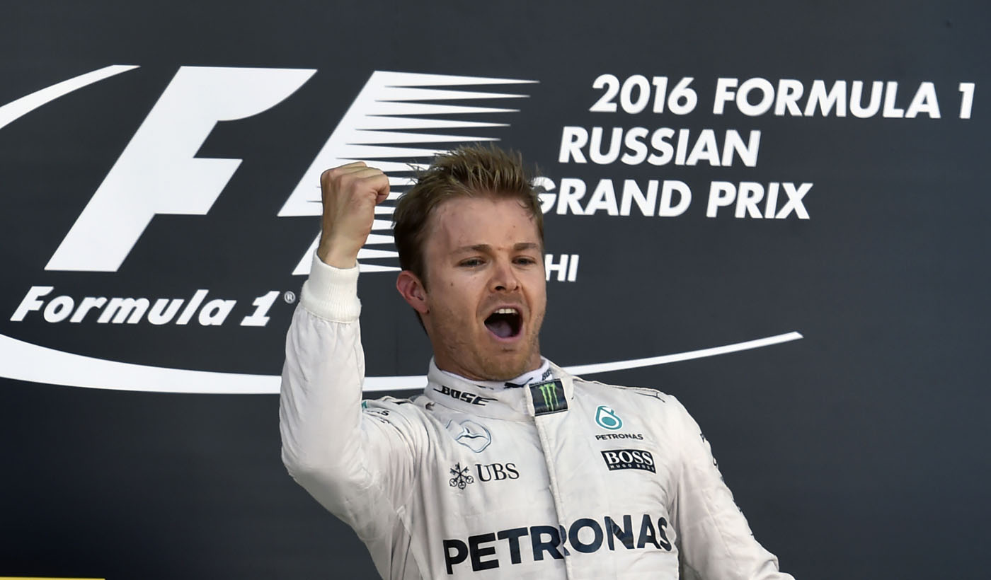 Mercedes AMG Petronas F1 Team's German driver Nico Rosberg celebrates on the podium after winning the Formula One Russian Grand Prix at the Sochi Autodrom circuit on May 1, 2016. / AFP PHOTO / YURI KADOBNOV